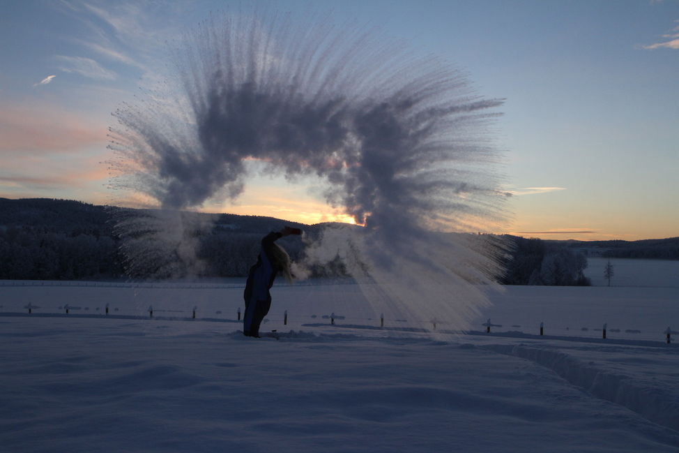 boiling water freezing weather snow winter throw sunset 